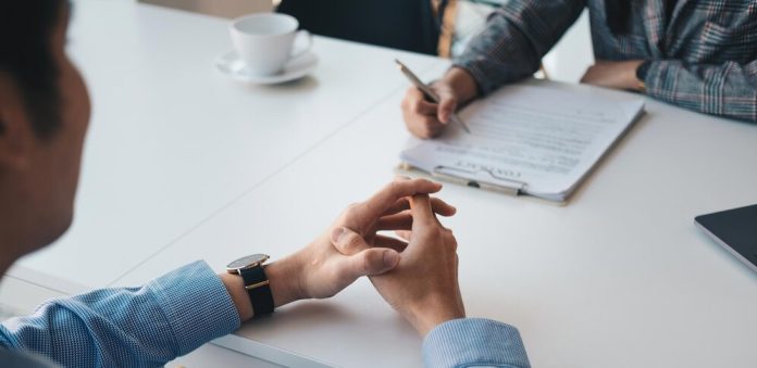 employer-recruiter-reading-resume-during-about-colloquy-his-profile-candidate-employer-conducting-job-interview-manager-resource-employment-recruitment-concept_1645-753