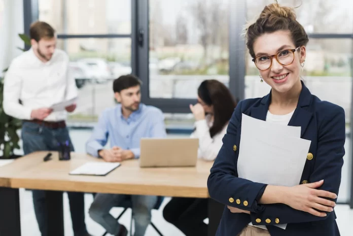 front-view-human-resources-woman-posing-office_23-2148507844 hr